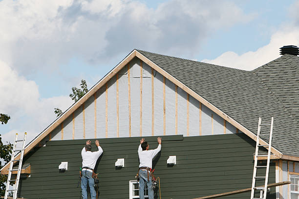 Professional Siding Installation technician working in White Plains, VA